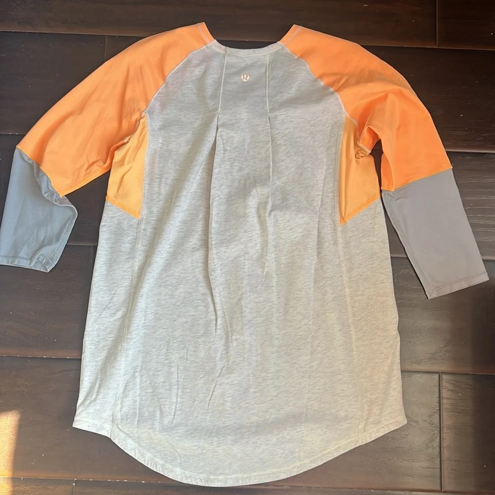 Lululemon Spin City Grey and Orange Top, size 6